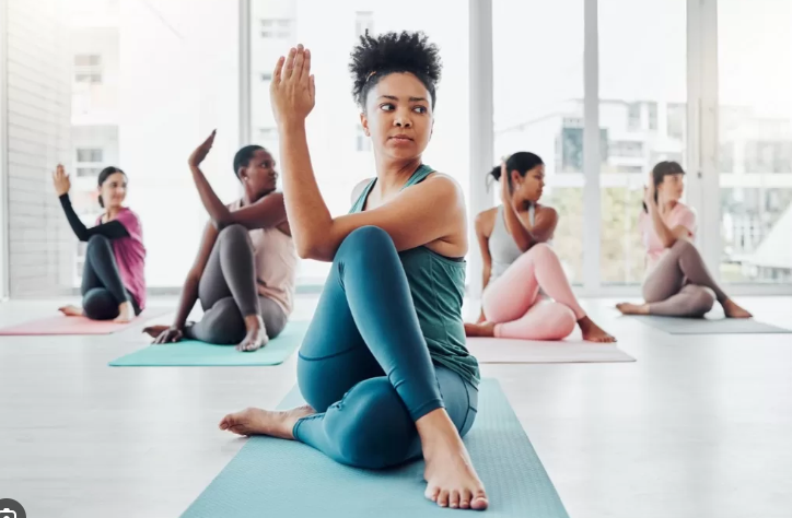 Women practicing yoga poses